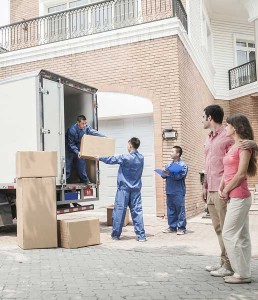 couple watching movers